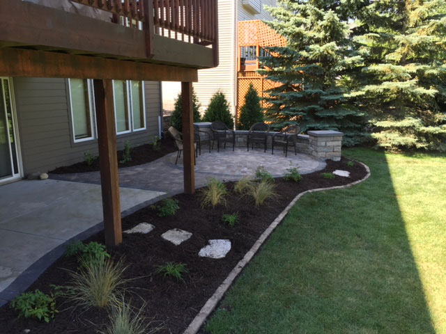 landscaping outdoor living area shrubs pavers creative earthscapes otsego minnesota